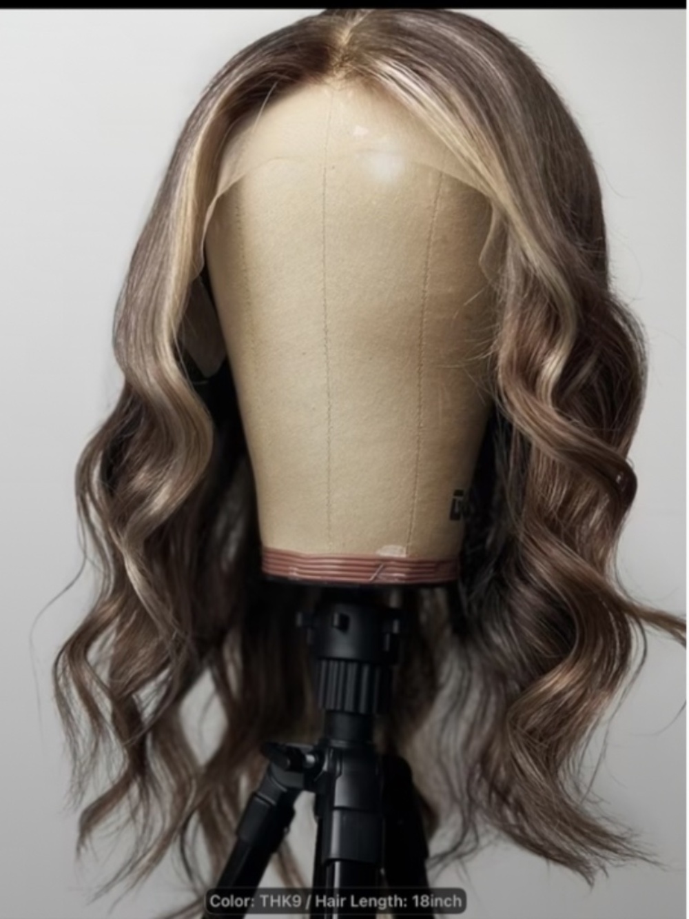 A 20-Inch, Density, Glueless Lace Front Wig Featuring Free Parting, Ash Blonde.